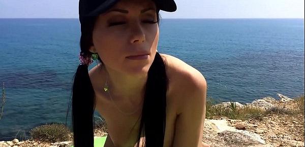  Before taking a tan Sasha Rose fingers her pink hole on the beach